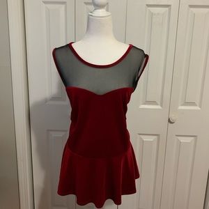 Sleeveless sheer peplum top